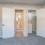 Bedroom with natural lighting in-unit laundry space