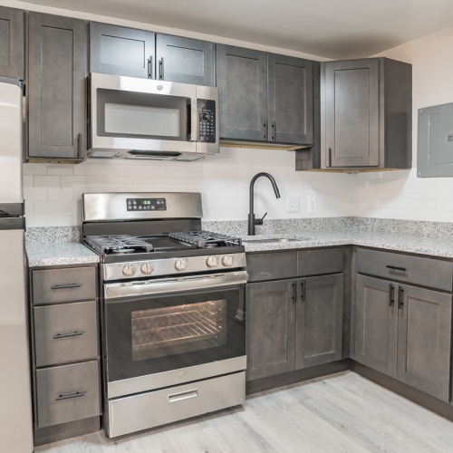 Well-lit kitchen with ample counter space Well-lit kitchen with ample counter space
