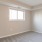 Bedroom with natural lighting and high ceilings